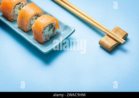 Philadelphia Shushi Rolls on Blue Background  Close Up Stock Photo