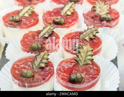 Cheesecakes on sale in confecionary shop, Abergavenny, Wales, UK Stock Photo