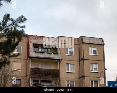 Prefabricated apartment building in a residential district in Eastern Europe. Pragmatic and economic architecture in Poland. Stock Photo