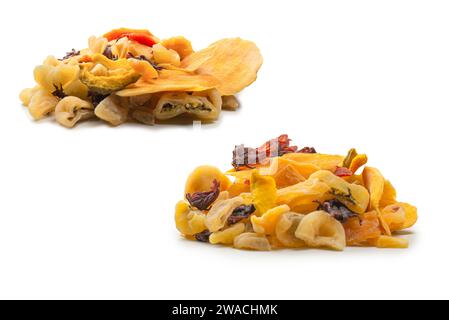 Mix of dried exotic fruit, mangos,slices of pineapples, passion fruit, papaya. Vegetarian dessert. Stock Photo