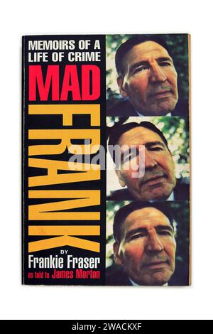 Memoirs Of A Life Of Crime, Mad Frank by Frankie Fraser, as told to James Morton. Paperback on white background. Studio set up. December 2023 Stock Photo