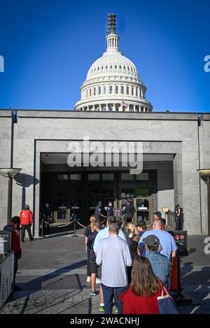 Dome of the US Capitol Building, of 19th century neoclassical architecture , rises above the tunneled entrance amongst stormy skies to the US Capitol' Stock Photo