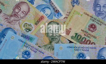 Concept for finance, wealth and currency exchange with a full frame image of Vietnam Dong showing the face of famed politician and leader Ho Chi Minh Stock Photo