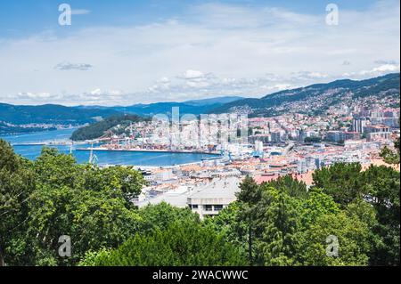 The view from the hill in Parque Monte del Castro, park located on a hill in Vigo, the biggest city in Galicia Region, in the North of Spain. View of the sea, houses and trees, selective focus Stock Photo