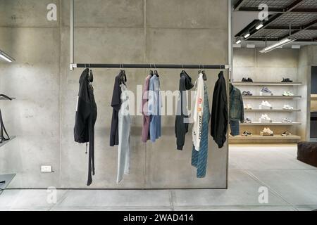 SINGAPORE - NOVEMBER 07, 2023: clothes on display in Balenciaga store inside Singapore Changi Airport. Stock Photo