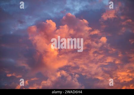 Clouds illuminated by setting sun Stock Photo