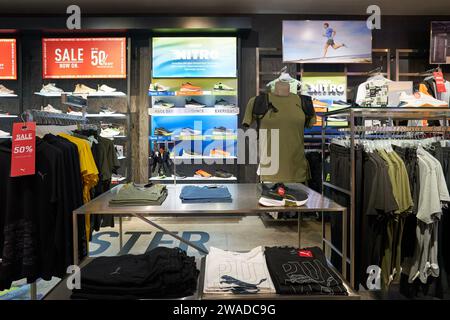 KUALA LUMPUR, MALAYSIA - MAY 29, 2023: inside Puma store in Suria KLCC shopping mall. Stock Photo