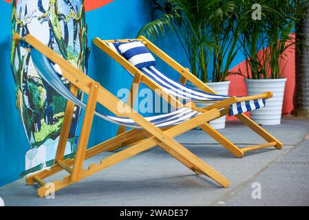 Close-up of leisure beach chairs placed in a relaxing hotel Stock Photo