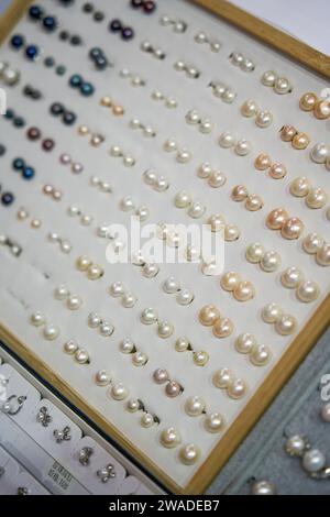 Close-up of pearl jewelry for sale in store Stock Photo