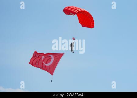 ISTANBUL, TURKIYE - MAY 01, 2023: Skydiving during Teknofest in Istanbul Ataturk Airport Stock Photo