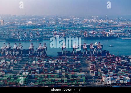A container terminal at Qingdao Port in east China's Shandong Province ...