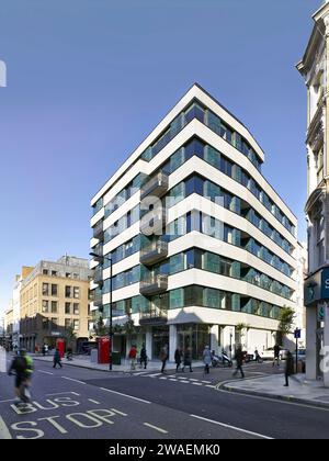 Corner elevation of building across street. Westbourne House, London, United Kingdom. Architect: Stiff + Trevillion Architects, 2015. Stock Photo