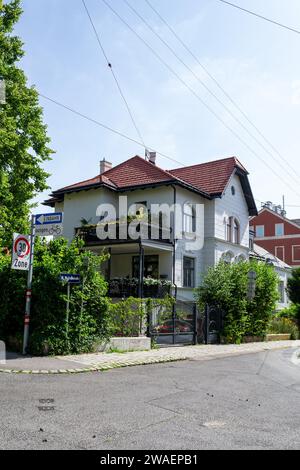 One small two-story house on the outskirts of Vienna, Austria, June 23, 2023 Stock Photo