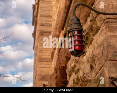 This is a photograph taken in Toronto of an old, rusty industrial lamp post. Stock Photo