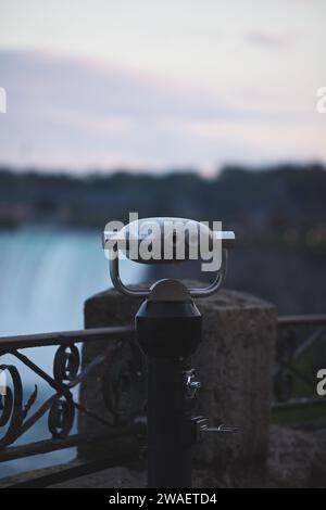 The viewpoint at Niagara Falls with a binocular in the foreground. Ontario, Canada Stock Photo