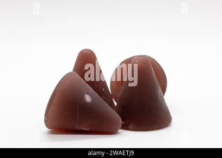 A closeup of cuberdon, a cone-shaped Belgian candy on a white background Stock Photo