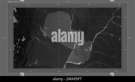 Paraguay highlighted on a Grayscale elevation map with lakes and rivers map with the country's capital point, cartographic grid, distance scale and ma Stock Photo
