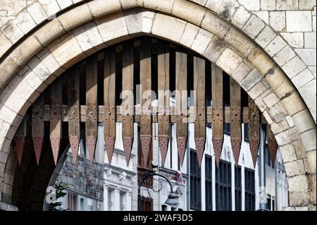 wooden portcullis with metal spikes at a medieval gate castle in the old town of cologne Stock Photo