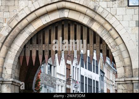 wooden portcullis with metal spikes at a medieval gate castle in the old town of cologne Stock Photo
