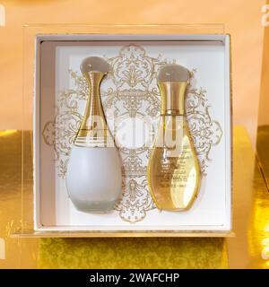 Bangkok, Thailand - November 26, 2023: J'adore Parfum d'Eau and J'adore Huile Divine within store display. Stock Photo