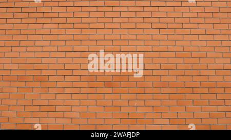 graphic resource of a red brick wall with a regular pattern of rectangles, background texture of brickwork with empty copy space Stock Photo