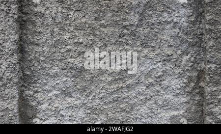 gray textured background of concrete surface with ribbed relief and empty copy space, graphic monochromatic textured solid solid material resource Stock Photo
