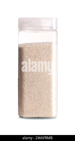 Fine sand in a plastic container. Cream colored, smooth and fine-grained sand. Close-up, front view, on white background, photo. Stock Photo