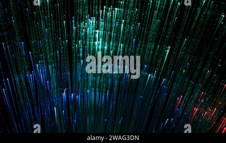Optical fiber network cable on black background Stock Photo