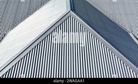 Drone aerial photograph of a grey coated corrugated iron roof on a domestic residence Stock Photo
