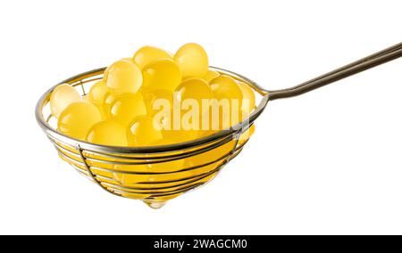 yellow jelly balls for making bubble tea in strainer isolated on white background Stock Photo