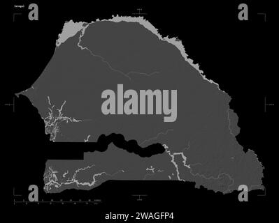 Shape of a Bilevel elevation map with lakes and rivers of the Senegal, with distance scale and map border coordinates, isolated on black Stock Photo