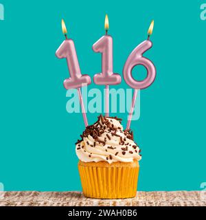 Birthday card with number 11 candle on aquamarine background Stock Photo