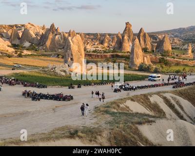 Quads and group of tourists near Cappadocia Fairy Chimneys Stock Photo