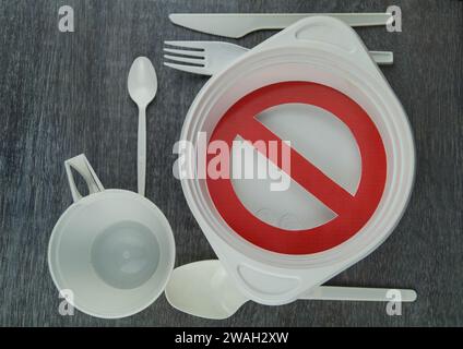 single-use tableware, plastic cutlery and prohibition sign, symbolic picture Stock Photo