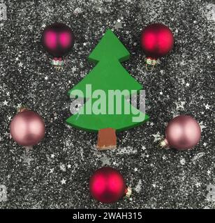 wooden decorative Christmas tree and baubles, Christmas decoration Stock Photo