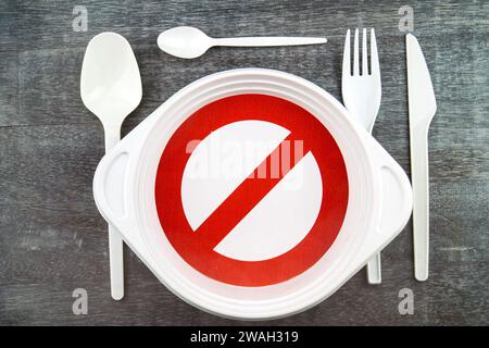 single-use tableware, plastic cutlery and prohibition sign, symbolic picture Stock Photo