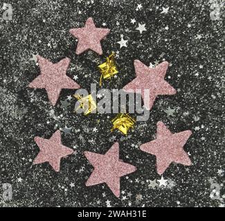 small golden gift packages and stars, Christmas decorations Stock Photo