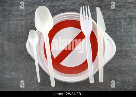 single-use tableware, plastic cutlery and prohibition sign, symbolic picture Stock Photo