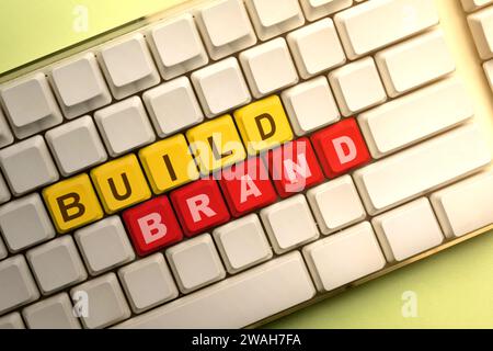 Closeup view of words of Build Brand on the computer keyboard button. Branding strategy concept Stock Photo