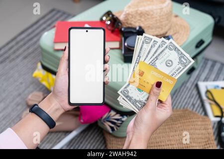 Credit cards and cash ready for travel Stock Photo