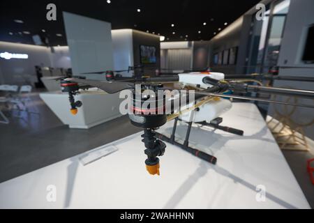 SHENZHEN, CHINA - NOVEMBER 22, 2019: close up shot of a drone on display inside China International Consumer Electronics Exchange/Exhibition Center (C Stock Photo
