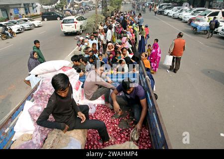 Dhaka, Bangladesh. 04th Jan, 2024. People wait in a line to buy daily essentials at subsidized prices from a Trading Corporation of Bangladesh (TCB) in Dhaka, Bangladesh on January 04, 2024. The government has started essentials selling programme in the capital at subsidised rate for the lower-income families. Photo by Habibur Rahman/ABACAPRESS.COM Credit: Abaca Press/Alamy Live News Stock Photo