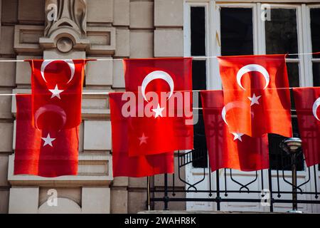 Turkish national flags with white star and moon in sky Stock Photo