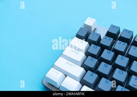 Mechanical keyboard isolated on blue background. After some edits. Stock Photo