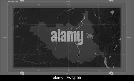 South Sudan highlighted on a Grayscale elevation map with lakes and rivers map with the country's capital point, cartographic grid, distance scale and Stock Photo