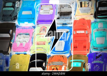 Battery symbol with cars as background. Concept of Electric cars. Stock Photo