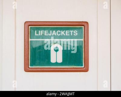 life jacket storage container cupboard on board a merchant cruise liner ship Stock Photo