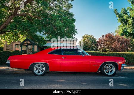 Tanunda, South Australia - January 18, 2014: 1966 Chevrolet Chevy Impala Super Sport SS 327 coupe parked on the street in Barossa Valley, SA Stock Photo