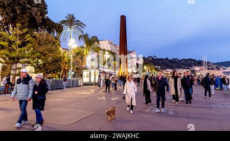People Walking Along The Promenade Des Anglais at Night Nice France Stock Photo