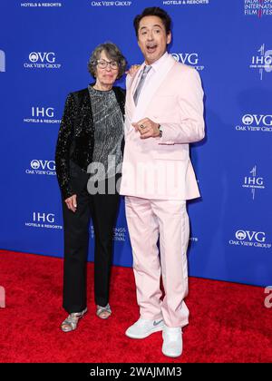 Palm Springs, United States. 04th Jan, 2024. PALM SPRINGS, RIVERSIDE COUNTY, CALIFORNIA, USA - JANUARY 04: Rosie Levin and Robert Downey Jr. arrive at the 35th Annual Palm Springs International Film Festival Film Awards held at the Palm Springs Convention Center on January 4, 2024 in Palm Springs, Riverside County, California, United States. (Photo by Xavier Collin/Image Press Agency) Credit: Image Press Agency/Alamy Live News Stock Photo